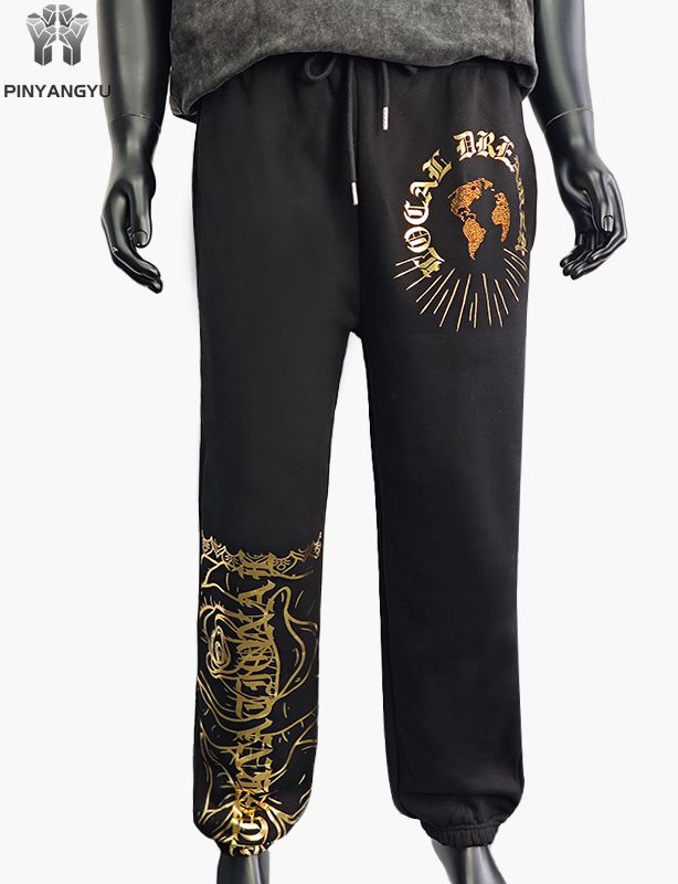 Broek met strass-ontwerp en gouden stempelontwerp