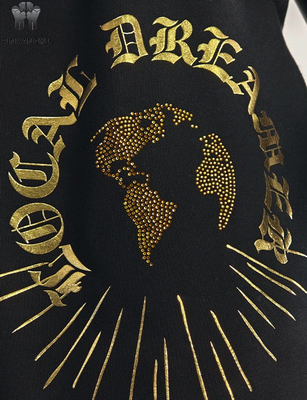 Broek met strass-ontwerp en gouden stempelontwerp