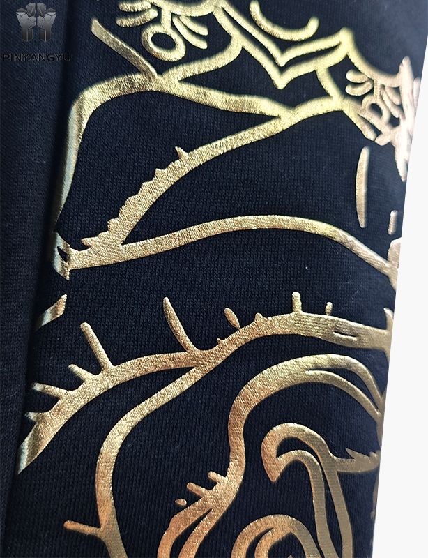 Broek met strass-ontwerp en gouden stempelontwerp