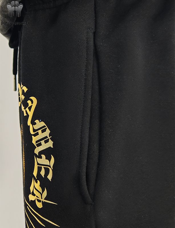 Broek met strass-ontwerp en gouden stempelontwerp