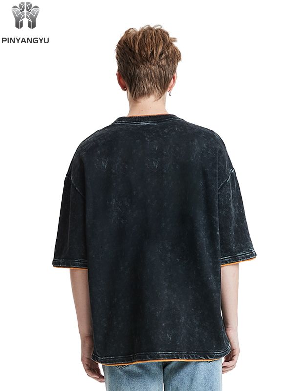 T-shirt met distressed wash en patchwork-ontwerp