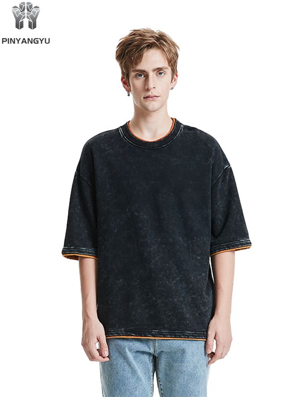 T-shirt met distressed wash en patchwork-ontwerp