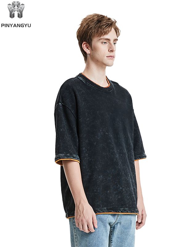 T-shirt met distressed wash en patchwork-ontwerp